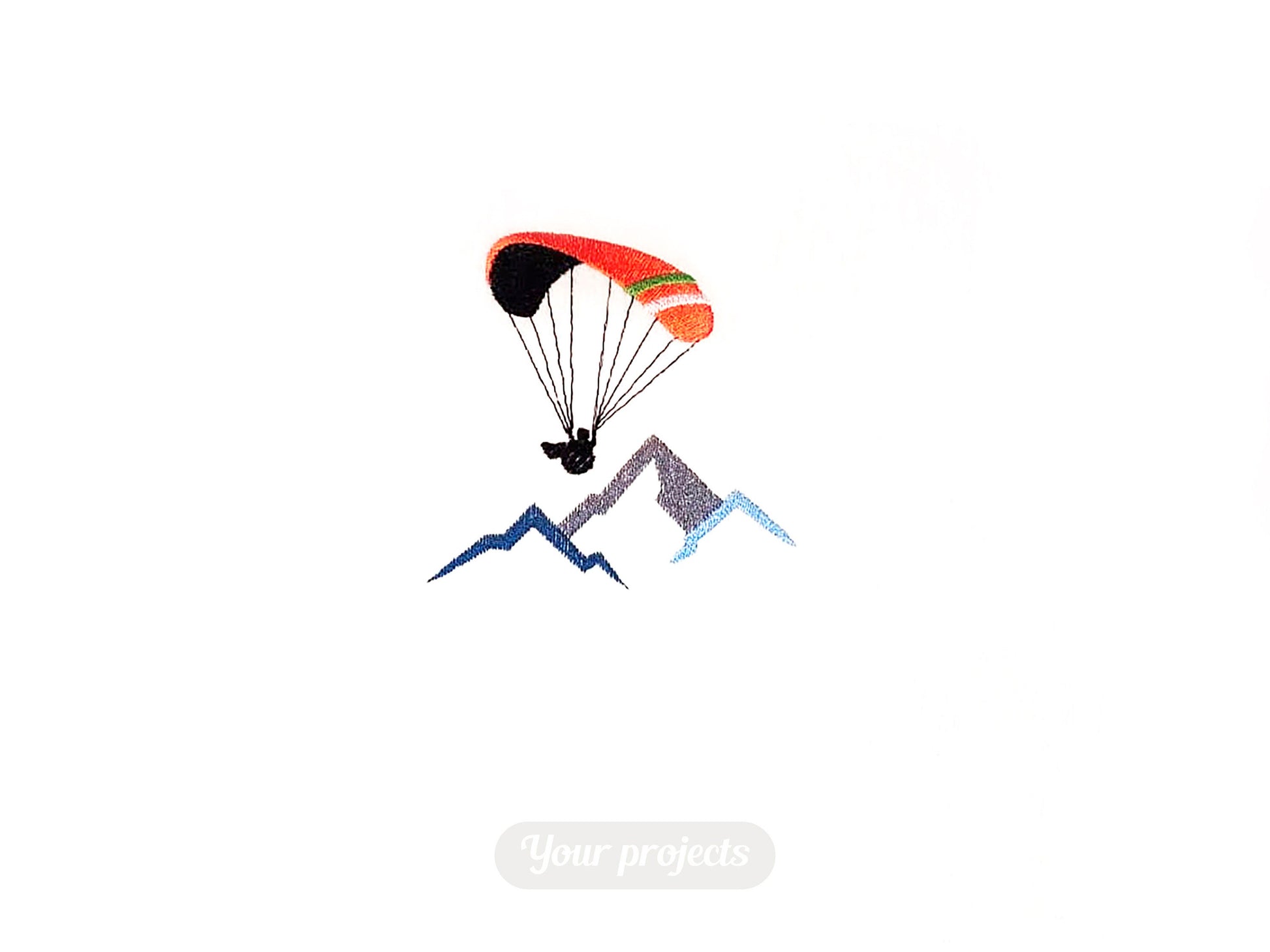 Paraglider over Mountains