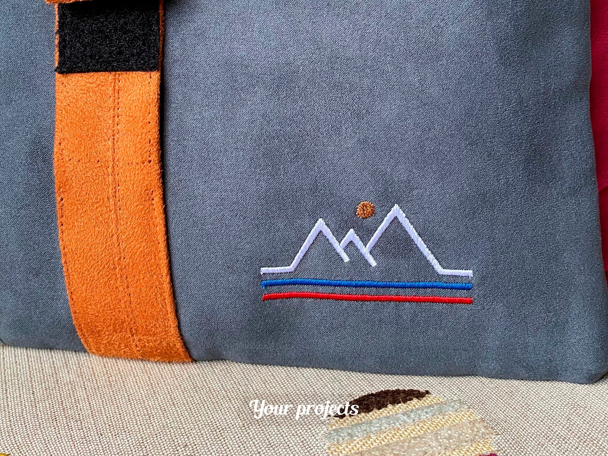Striped Mountains with Sun Logo