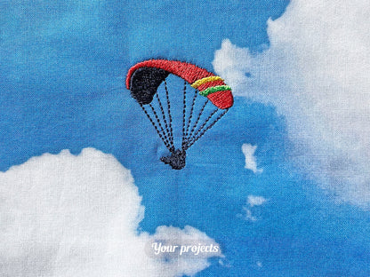Paraglider over Mountains